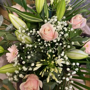 6 x pink roses and white lilies with other pink / white flowers and heart pic in gift bag